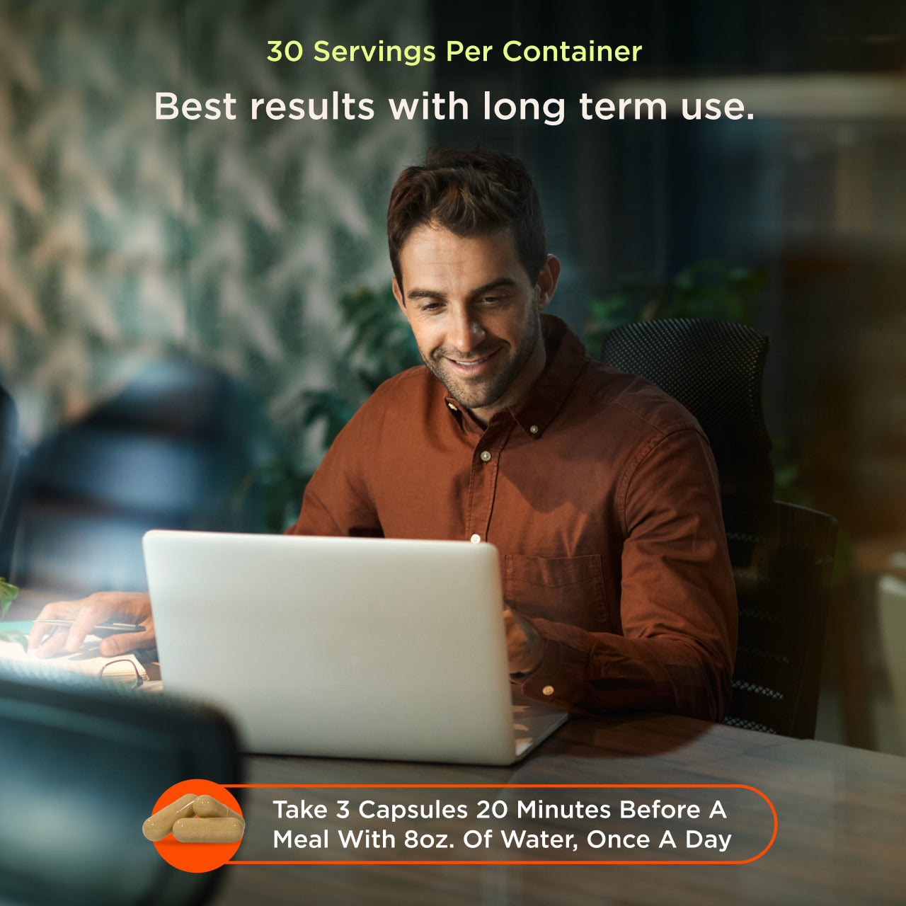 Man using a laptop with text about capsules and servings per container.